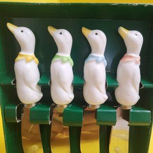 Set of 4 Vintage goose spreaders, pastel bibs, never used